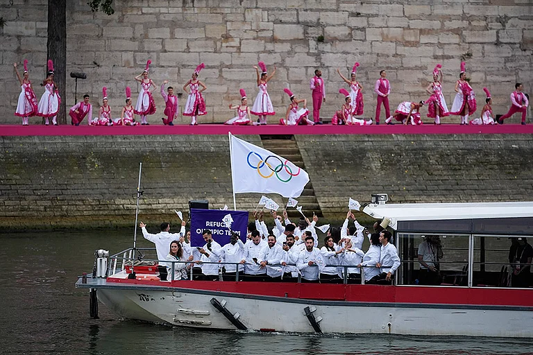 2024 Olympic Refugee team - | Photo: AP/Lindsey Wasson